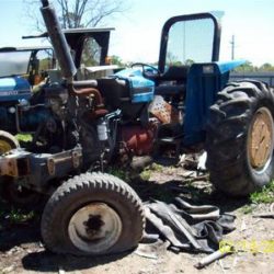 SALVAGE FORD NEW HOLLAND 6640 TRACTOR FOR PARTS GULF SOUTH EQUIPMENT SALES BATON ROUGE LOUISIANA