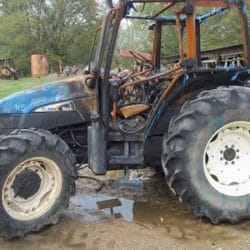 SALVAGE FORD NEW HOLLAND TL100 TRACTOR FOR PARTS GULF SOUTH EQUIPMENT SALES BATON ROUGE LOUISIANA
