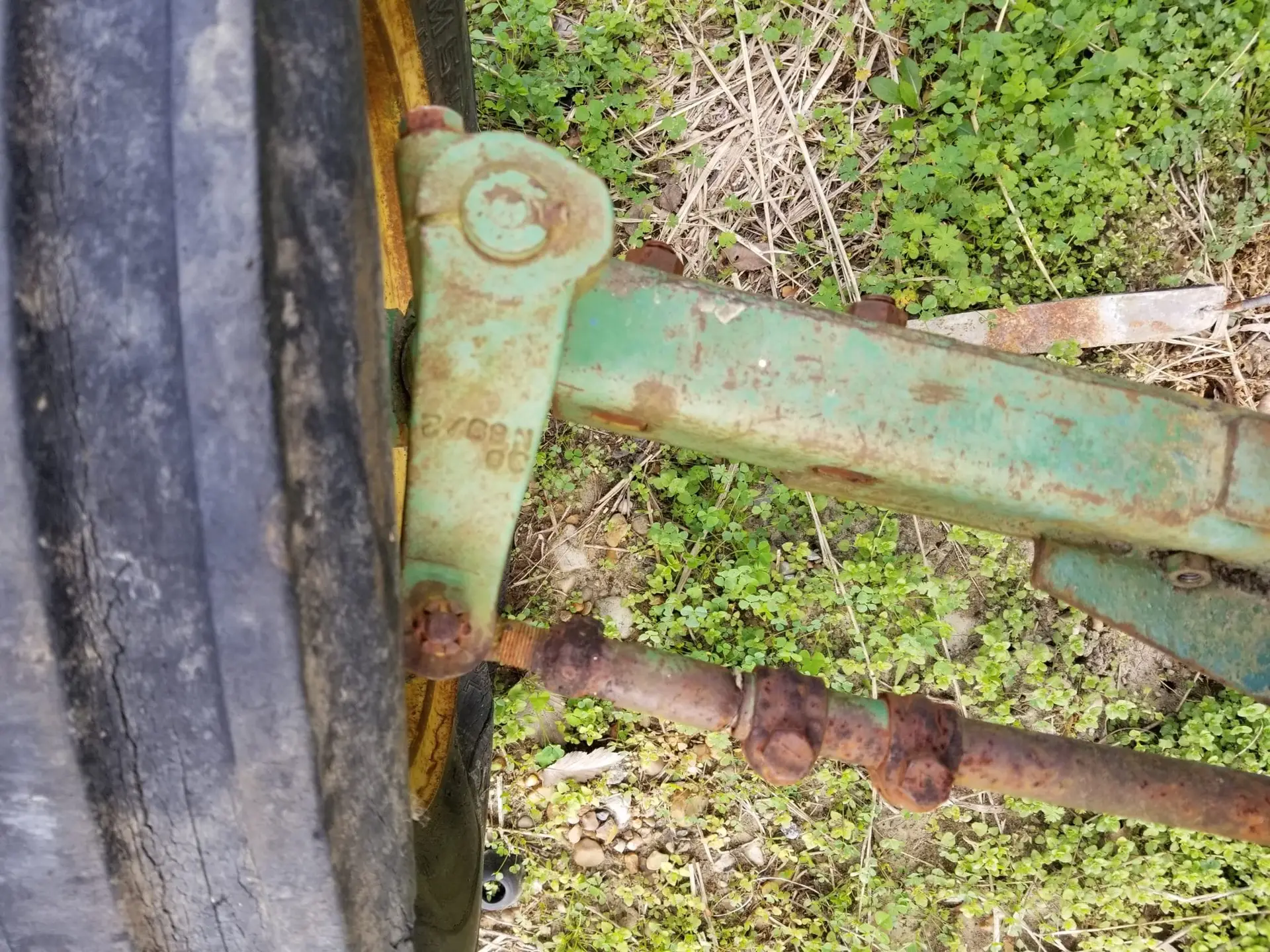 USED DEERE 950 RIGHT HAND STEERING ARM