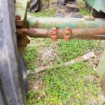 USED DEERE 950 RIGHT HAND FRONT AXLE KNEE