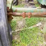 USED DEERE 950 RIGHT HAND FRONT AXLE KNEE