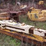 USED DEERE AND CASE BACKHOE BOOMS AND DIPPERS