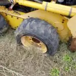 USED KOMATSU SK714 SKID STEER WHEEL