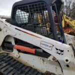 USED BOBCAT T650 SKID STEER LIFT ARM ASSEMBLY