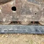 USED BOBCAT T650 SKID STEER BOTTOM ROLLERS