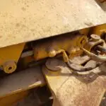 USED DEERE 450E DOZER TRACK ADJUSTER/RECOIL SPRING.