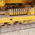 USED DEERE 450E DOZER TRACK ADJUSTER/RECOIL SPRING.