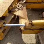 USED DEERE 450E DOZER BLADE TILT CYLINDER.