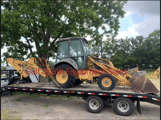 Ford New Holland 555E 2wd Backhoe with Clamshell Loader Bucket and Extend A Hoe