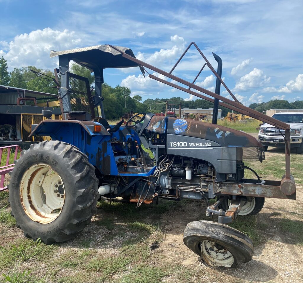 New Holland TS100 Tractor in for Parts