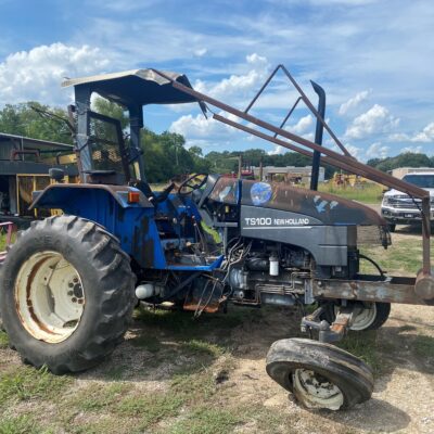 New Holland TS100 Tractor in for Parts