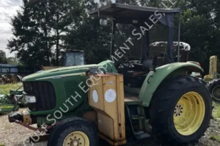 John Deere 6320 tractor with side boom mower available for salvage